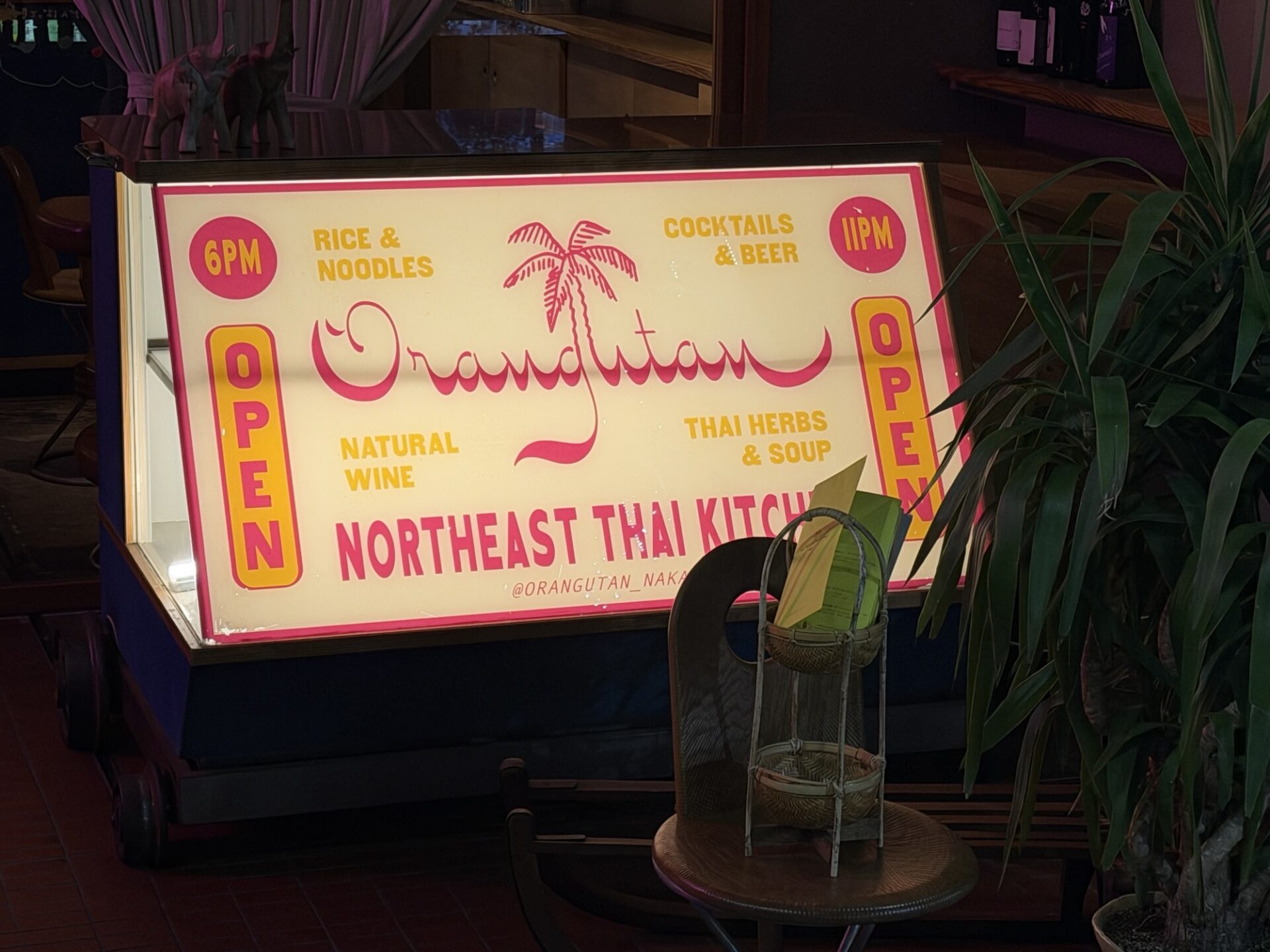 The illuminated Orangutan lightbox sign at the entrance of LOU